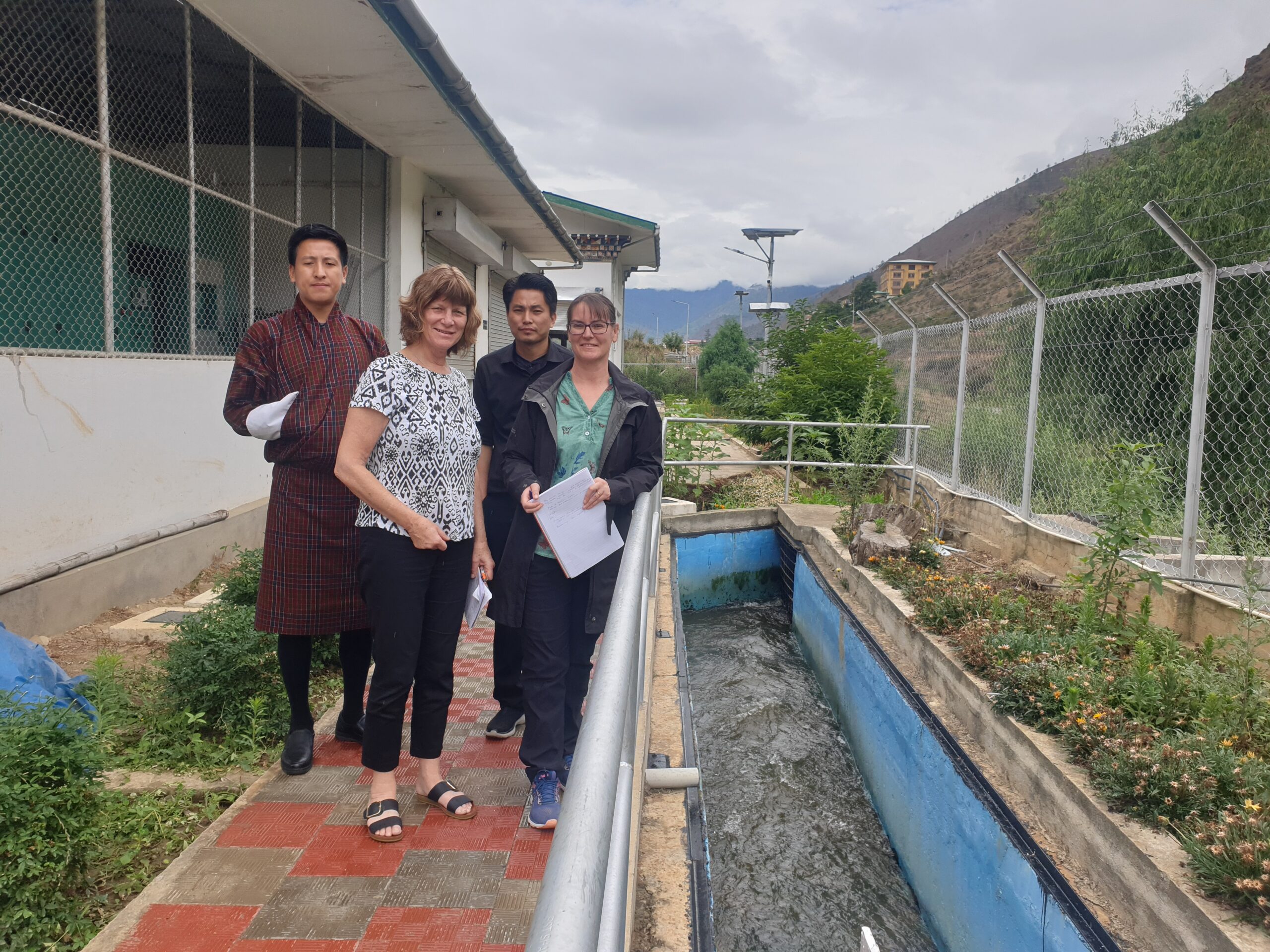 Viewing the treated waste water outlet at the major waste water treatment p[lant servicing 80% of Thimpu, the capital city of Bhutan.
